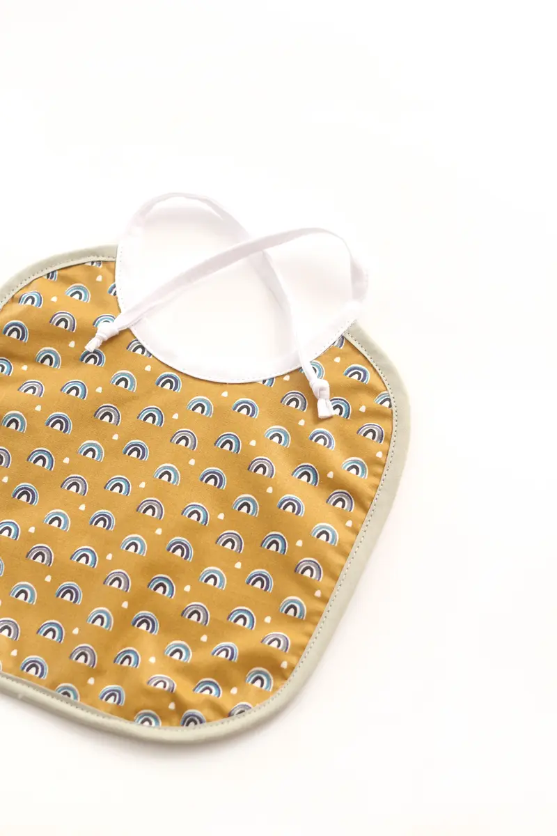 Bavoir bébé en coton enduit / Rainbow caramel