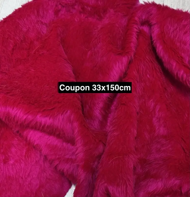 Coupon tissu fausse fourrure douce et légère rose fuchsia à poils mi-longs 33cm x 150cm