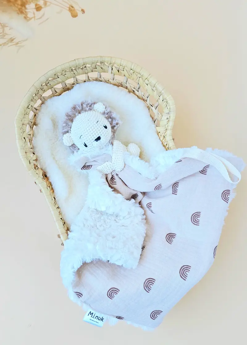 Doudou lion attache-tétine