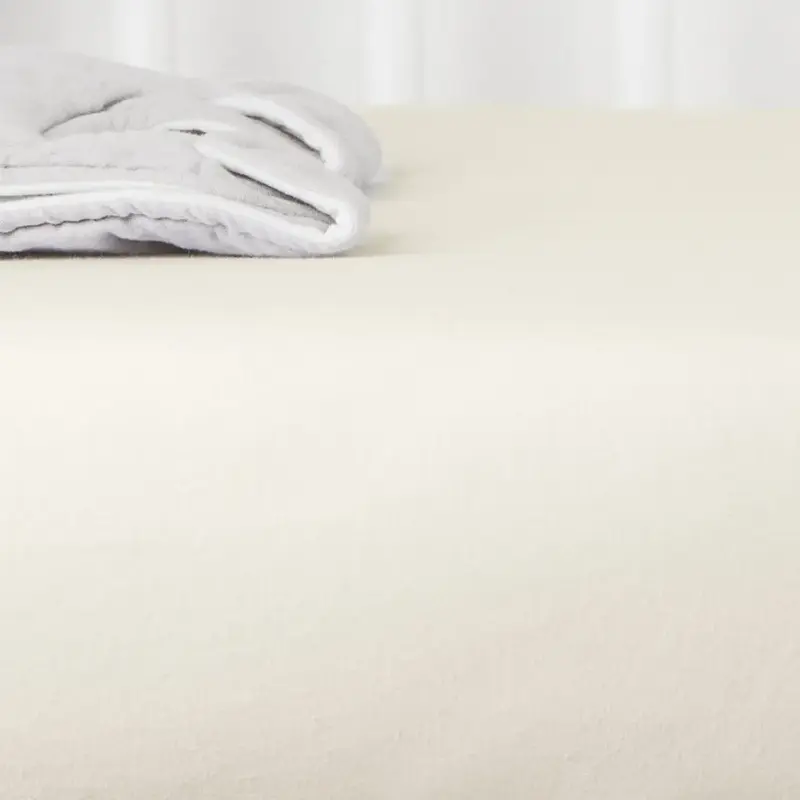 Drap housse en jersey de coton bio Kadolis pour lit bébé - Naturel