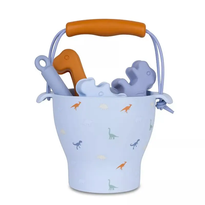 Ensemble de jeux de plage dinosaures