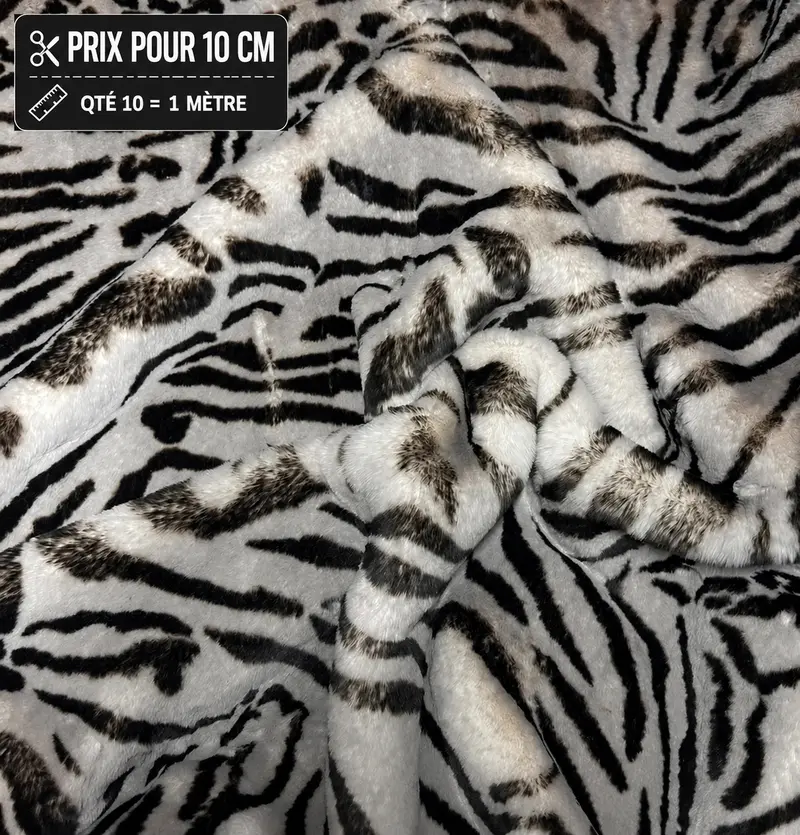 Fausse fourrure zèbre noir et blanc à la coupe – poils 2,5 cm – vendue par 10 cm