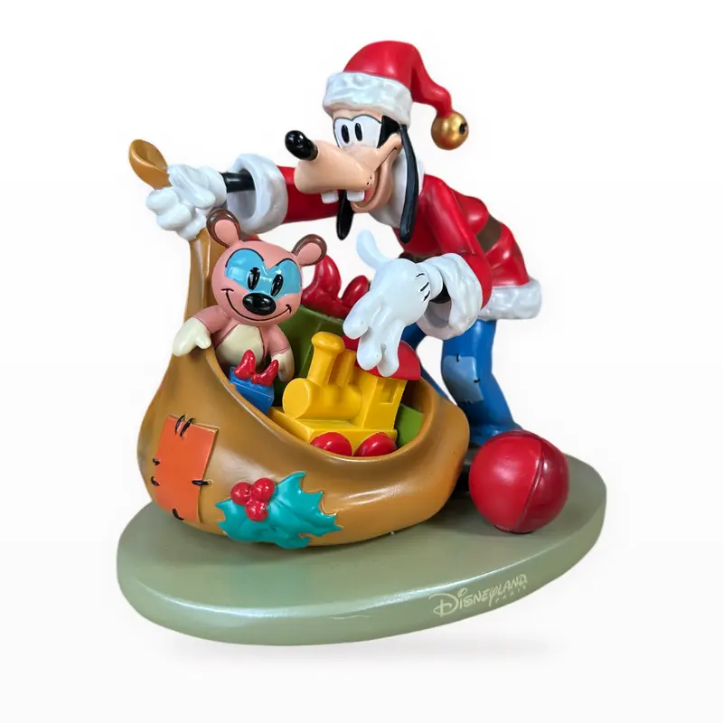 Figurine de Noël Dingo avec sac de cadeaux – Disneyland Paris