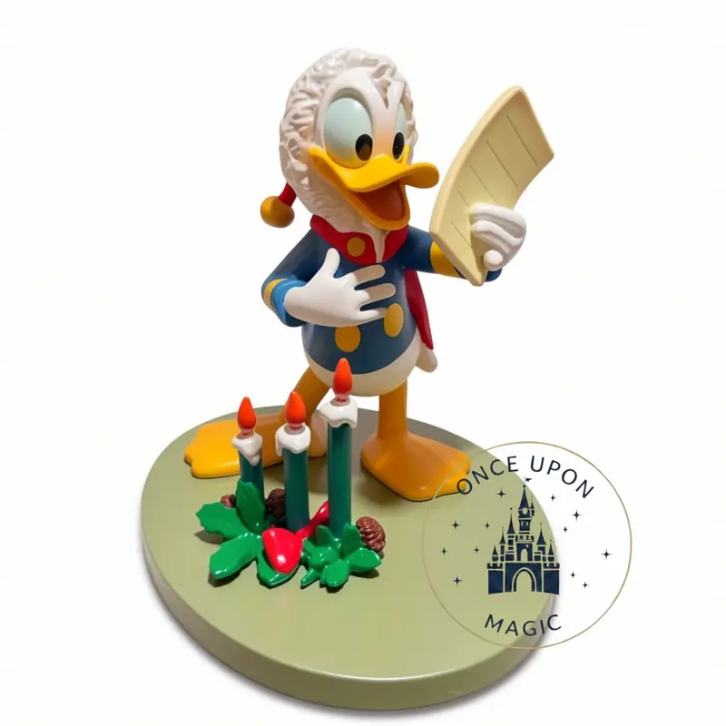 Figurine Donald Duck chanteur de Noël – Disneyland Paris