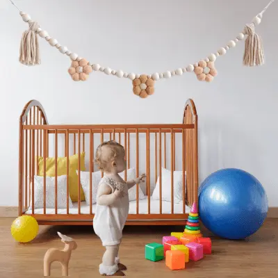 Guirlande pompons chambre bébé│Bohonia