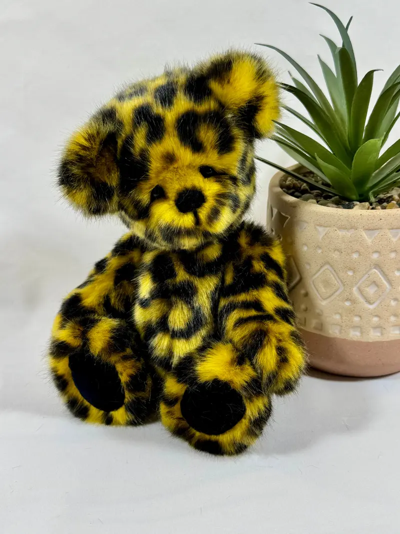 Mango – Ours de collection articulé 20 cm en fausse fourrure jaune et noire 🐾✨