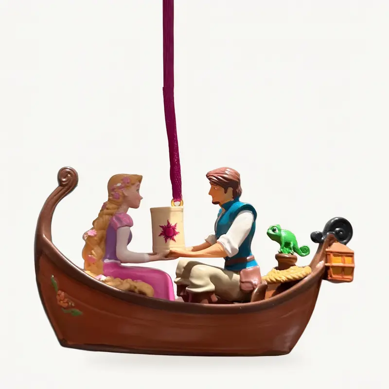 Ornement de Noël Raiponce, Flynn et Pascal en barque – Disneyland Paris