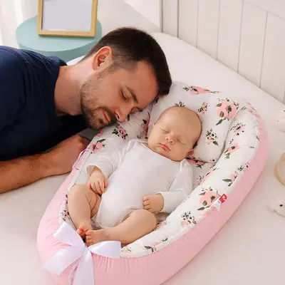 Réducteur de lit bébé -NidPortablePourBébé™ | Rose