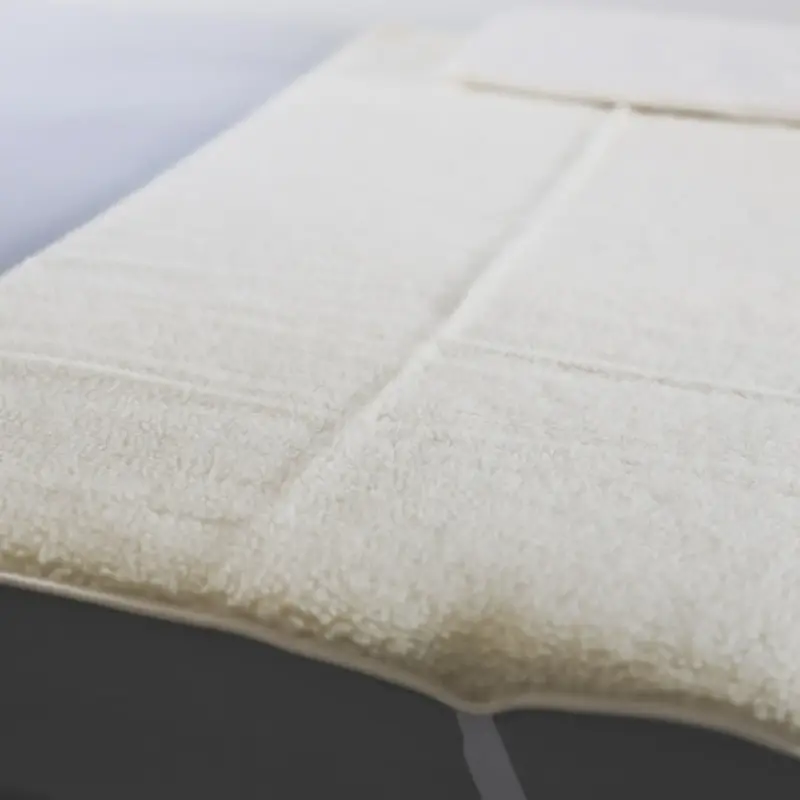 Surmatelas fin en laine vierge Sassoupi - 140x200cm