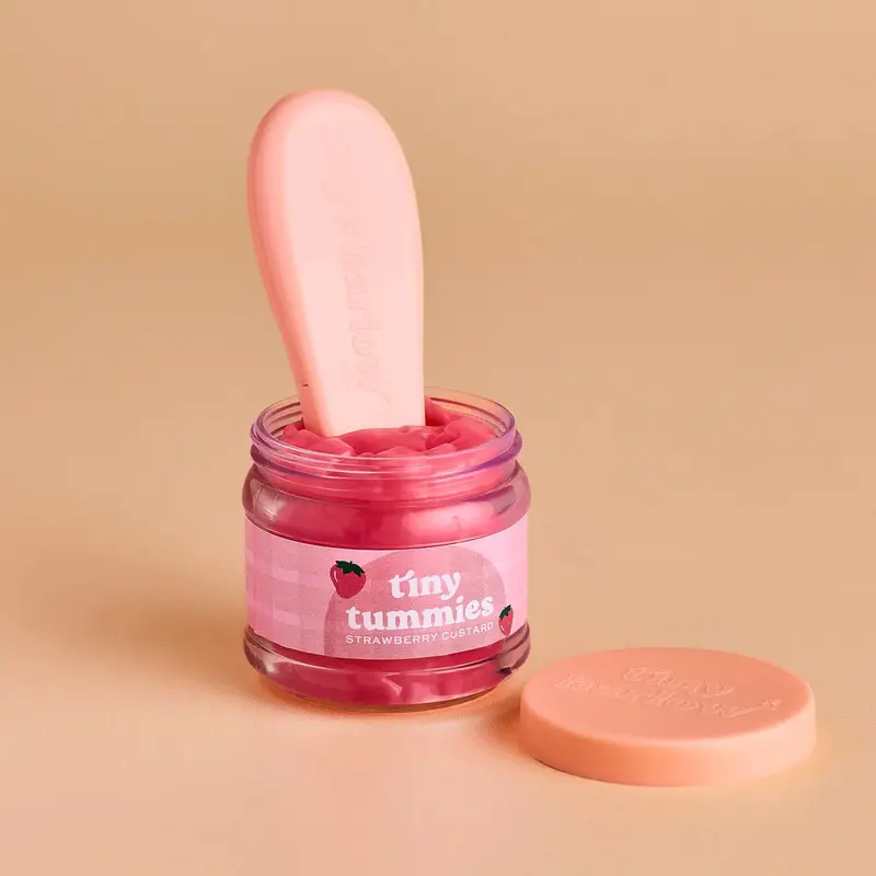 Tiny Harlow Tiny Tummies – Petit pot magique pour poupée fraise